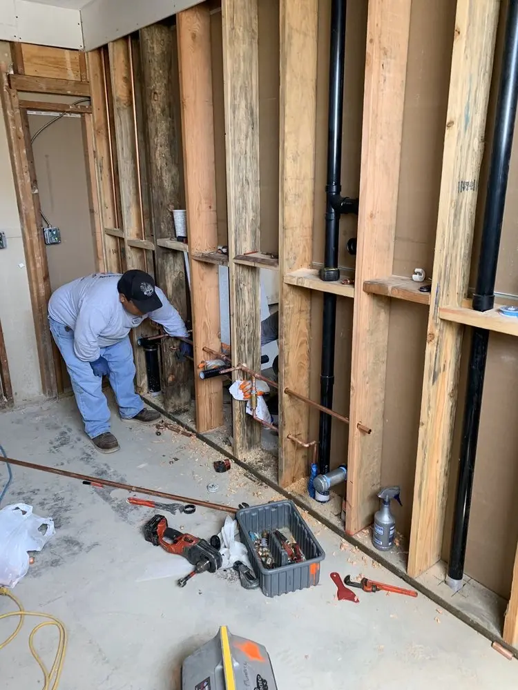 Commercial rough-in plumbing for Water Heater Replacement in Valmy